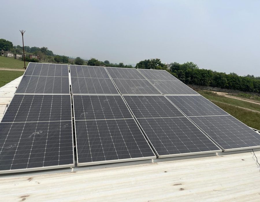 Solar panels mounted on the farmhouse roof